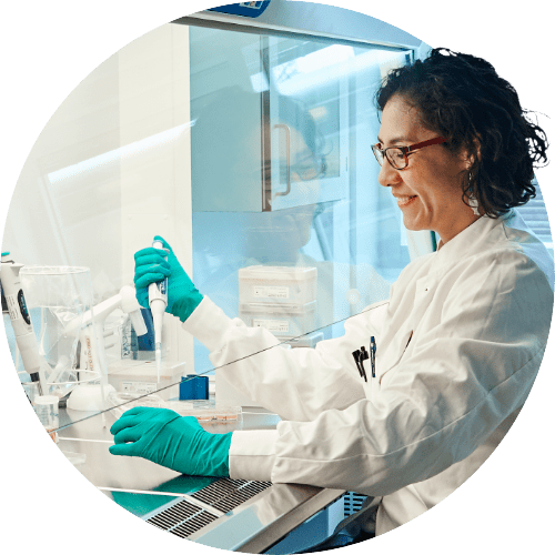Professional lab technician analyzing probiotics